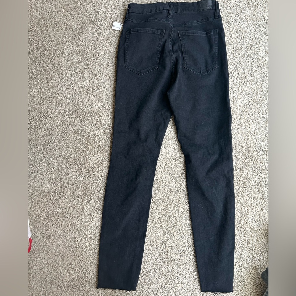 New with tags black ripped jeans